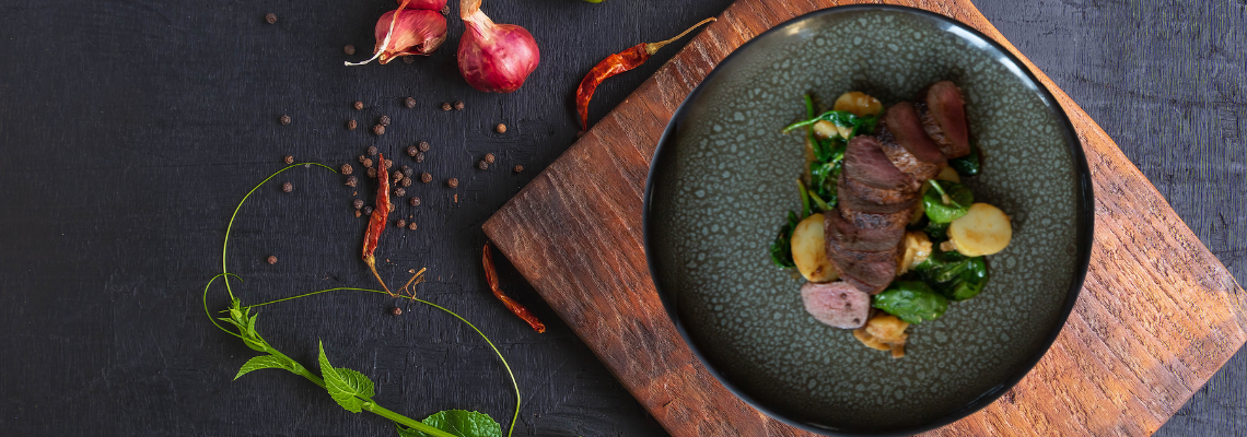 Pan fried Springbok loin with baby potatoes