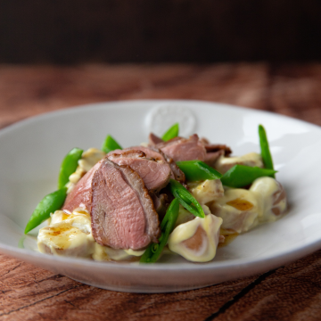 Pan fried duck breast with mange tout